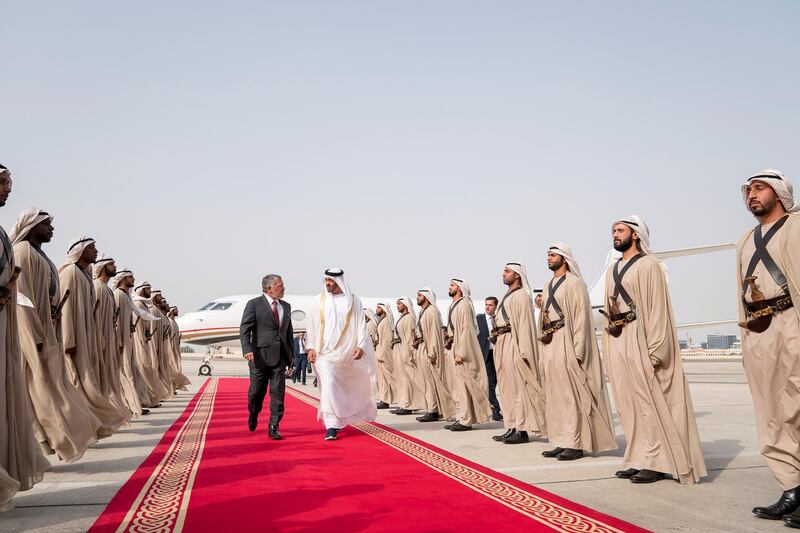 ABU DHABI, UNITED ARAB EMIRATES - July 27, 2018: HH Sheikh Mohamed bin Zayed Al Nahyan, Crown Prince of Abu Dhabi and Deputy Supreme Commander of the UAE Armed Forces (R), receives HM King Abdullah II, King of Jordan (L), at Al Bateen Airport.

( Rashed Al Mansoori / Ministry of Presidential Affairs )
---