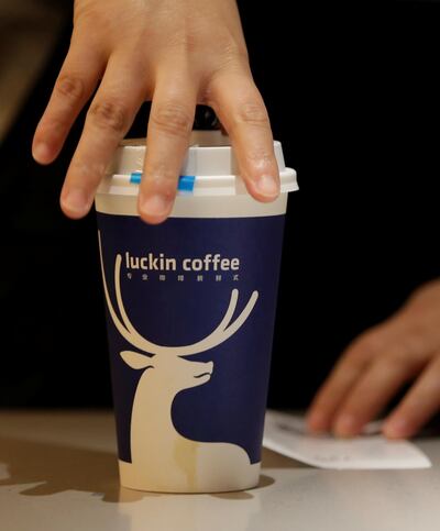 A barista prepares a coffee for online sales at a Luckin Coffee store in Beijing, China July 17, 2018. Picture taken July 17, 2018. REUTERS/Jason Lee