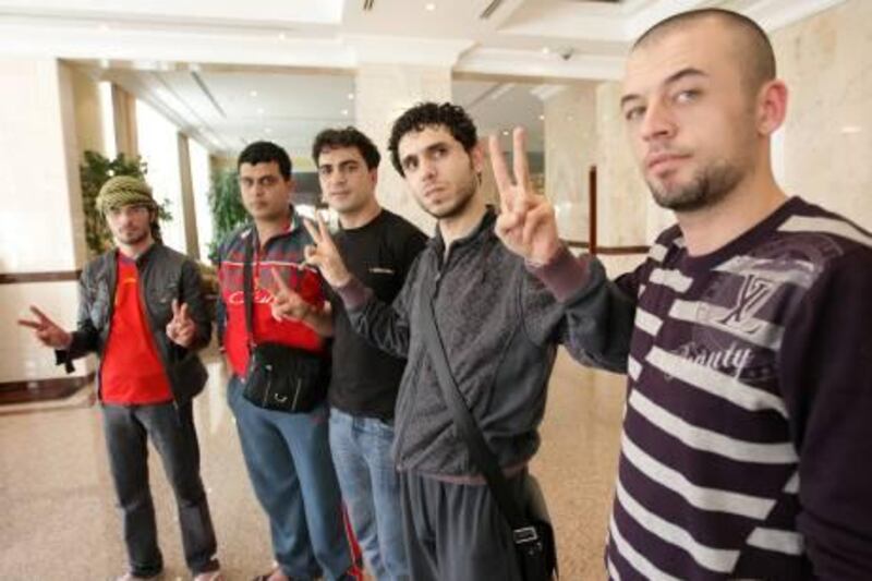 UAE - Dubai - March 15 - 2011: Some of the eight Palestinians that were stranded at Dubai International Airport for more than 45 days, talk with a reporter from The National at Copthorne Airport Hotel. While awaiting permission to return home through Egypt will be allowed to stay in Dubai until their situation is resolved. 
Hossam abu Ghaloun, 25
Mohammed al Khatib, 28
Hani abu Sha'ar, 29
Ghassan Shakshak, 28 
Ghassan Salem, 21 

 ( Jaime Puebla - The National Newspaper )