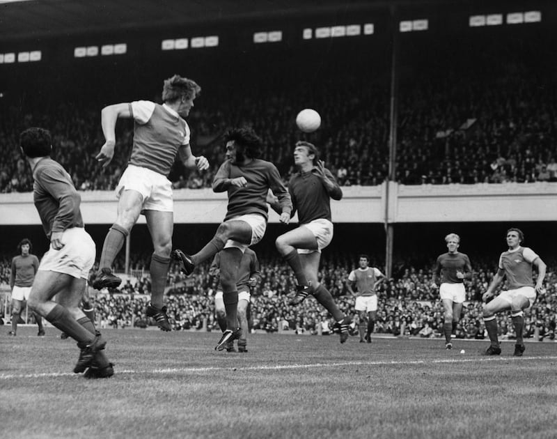 George Best of Manchester United leaps for a header near the United goalmouth during their match against Arsenal at Highbury Stadium on 22 August, 1970.   (Photo by Peter King/Getty Images)