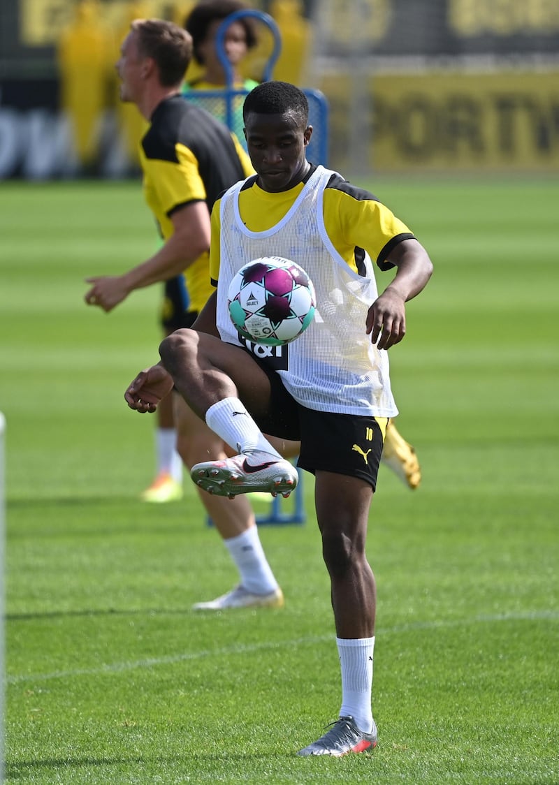 Borussia Dortmund’s Youssoufa Moukoko dribbles a ball during a training session. AFP