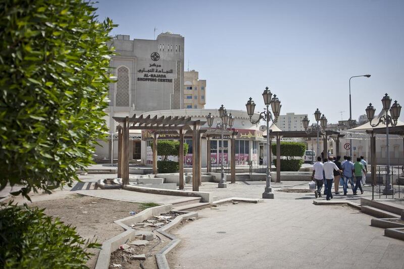 29/03/2014 DOHA, QATARA The Al-Najada Shopping center, near the Msheirab Neighbourhood construction site. Planned to cover 31 hectares when finished, the project includes high-end residences and shopping, cultural centres and government buildings. It is but one of many ambitious developments that Qatar hopes to complete by the time it hosts the football World Cup in 2022.