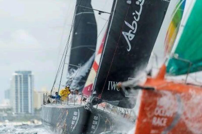 Abu Dhabi Ocean Racing, skippered by Ian Walker, chase down Groupama.