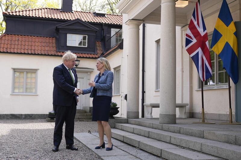 Earlier, he was greeted by Swedish Prime Minister Magdalena Andersson. AFP