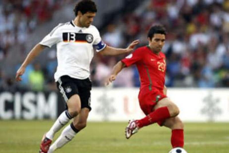 The Portuguese midfielder Deco, right, holds off Germany's Michael Ballcak during Euro 2008. They will be playing on the same team domestically this season after Deco signed a deal to join Chelsea in the English Premier League from Barcelona.