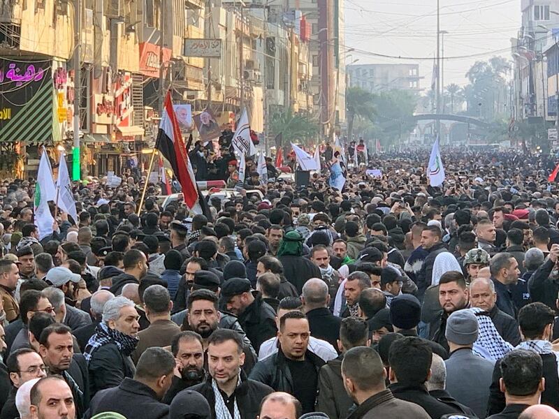 People gather at the funeral of Qassem Suleimani and the Iraqi militia commander Abu Mahdi al-Muhandis in Baghdad, Iraq. Reuters