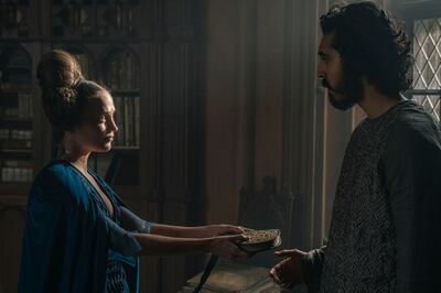 Alicia Vikander, left, stars opposite Dev Patel in 'The Green Knight'. AP