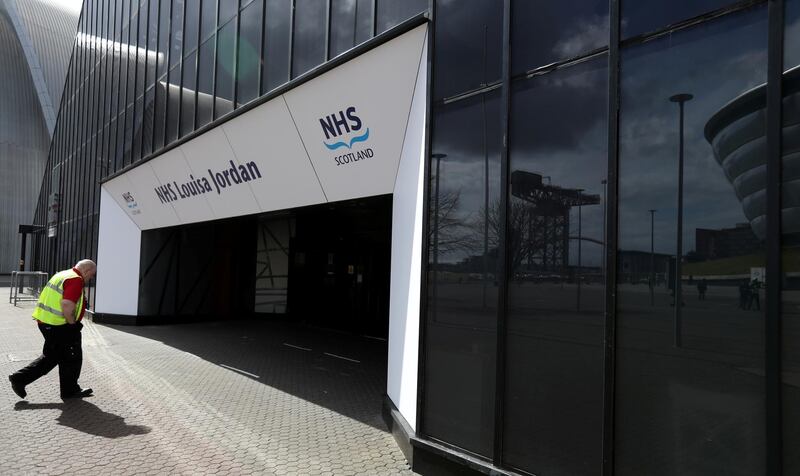 Signage to the entrance of the new NHS Louisa Jordan Hospital has been installed, during the coronavirus disease (COVID-19) outbreak in Glasgow, Scotland, Britain. REUTERS
