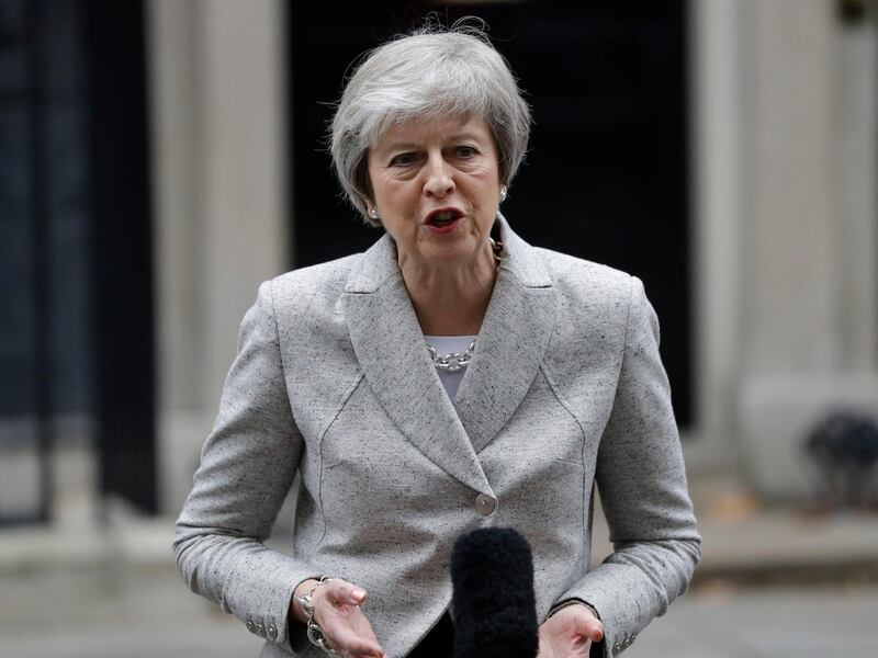 Britain's Prime Minister Theresa May makes a statement outside 10 Downing Street, London, Thursday Nov. 22, 2018. (AP Photo/Kirsty Wigglesworth)