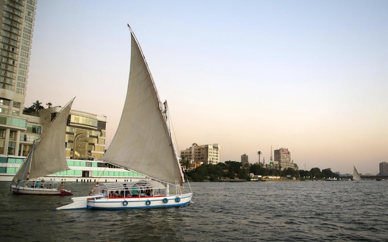 epa08615378 A sailboat on the Nile river in Cairo, Egypt, 20 August 2020.  EPA/KHALED ELFIQI