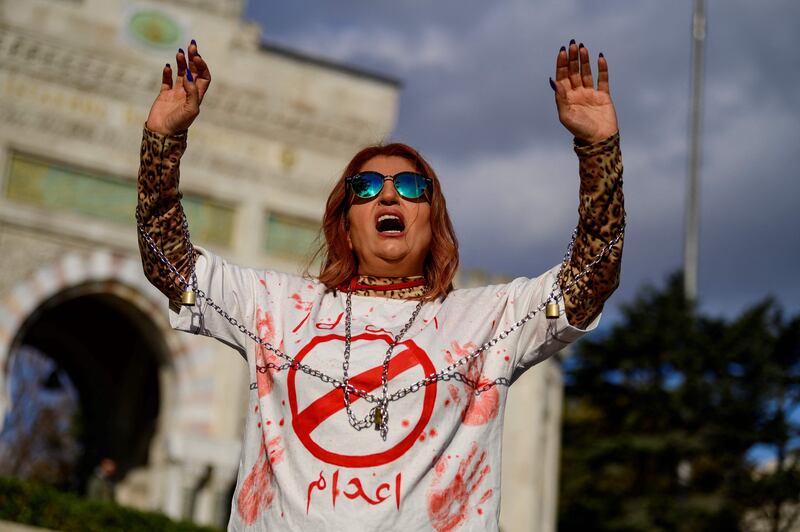 A woman at a rally in support of Iranian women in Istanbul. The US is lobbying for Iran to be removed from a UN women's equality body. AFP