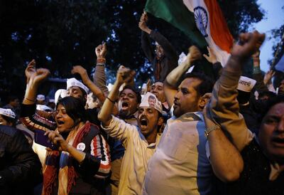 Aam Aadmi Party activists shout slogans after clashes with Bharatiya Janata Party in New Delhi. Manish Swarup / AP