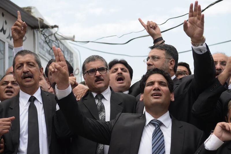 Pakistani lawyers shout slogans during a protest against the killing of their colleagues a day after a suicide bombing struck a crowd of lawyers outside the Civil Hospital in Quetta on August 9, 2016. Aamir Qureshi/AFP





