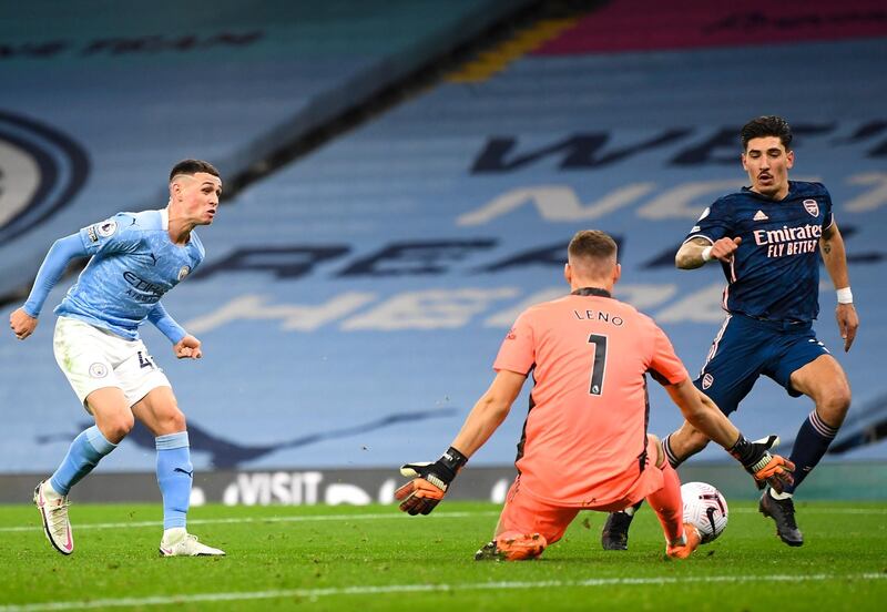 City's Phil Foden sees his shot saved by Arsenal goalkeeper Bernd Leno. EPA