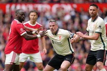 Manchester United Legends' Louis Saha and Liverpool Legends' Jamie Carragher during the Legends match at Old Trafford, Manchester. Picture date: Saturday May 21, 2022.