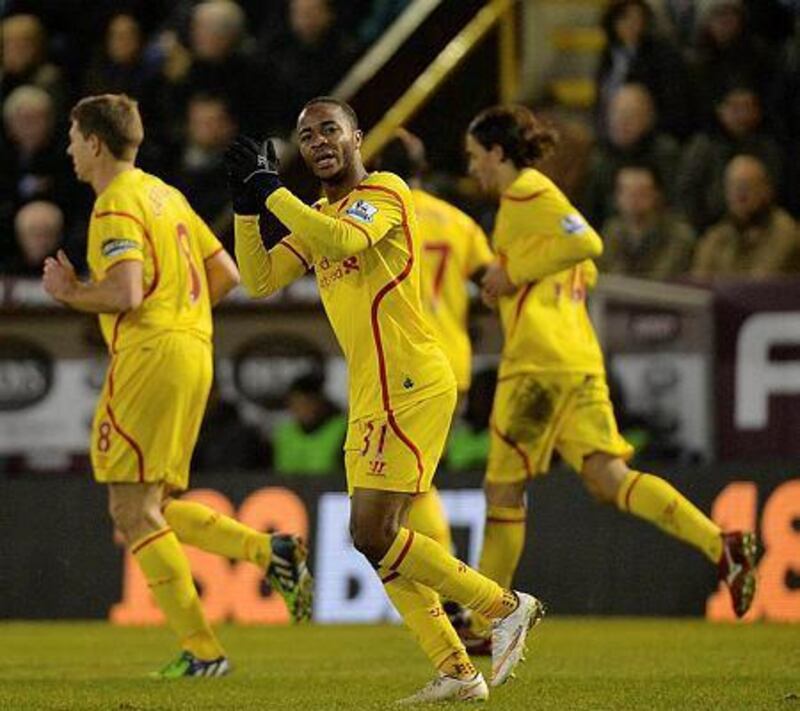Raheem Sterling celebrates the opening goal during the English Premier League match against Burnley at the Turf Moor stadium in Burnley, Britain, 26 December 2014. EPA/PETER POWELL
