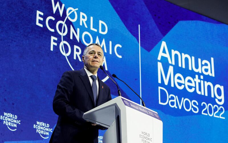 Swiss President Ignazio Cassis addresses delegates during the opening ceremony. Reuters