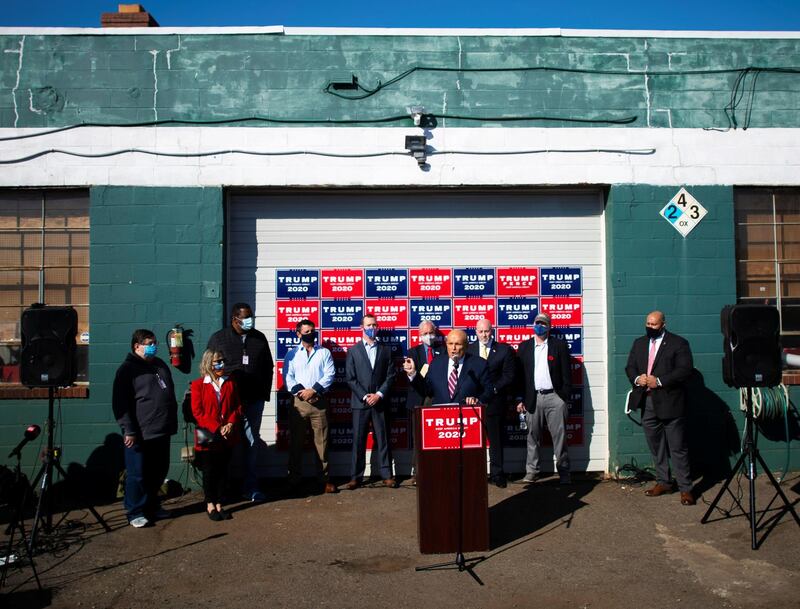 Former New York Mayor Rudy Giuliani addresses the media with the Trump legal team, at the Four Seasons Landscaping company in Philadelphia. Reuters