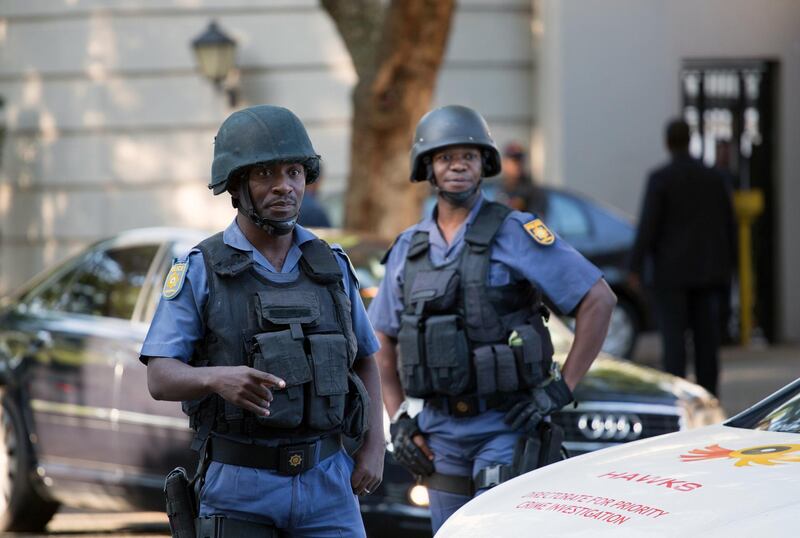 Police close off roads around the Gupta's home. James Oatway / Reuters