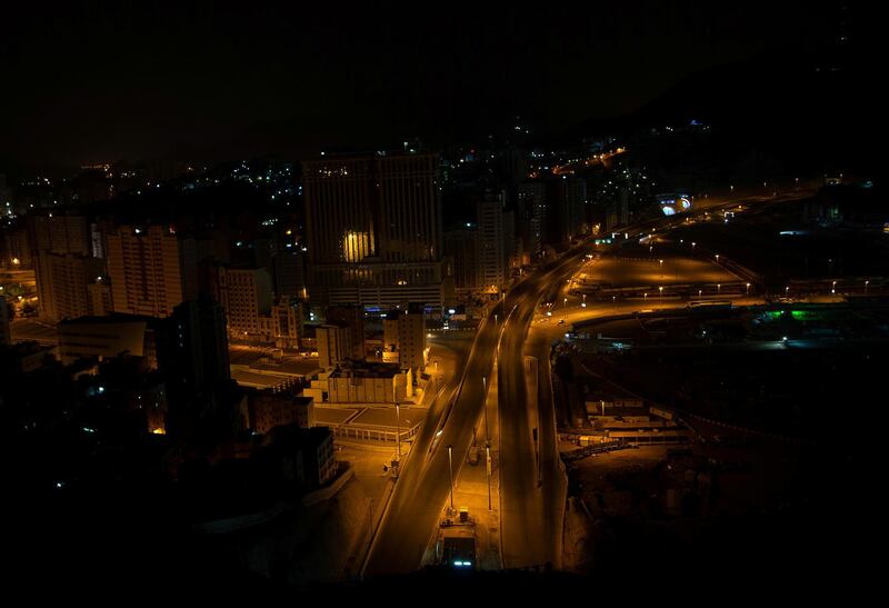 A view of a deserted street during a curfew imposed to prevent the spread of the coronavirus disease in the holy city of Makkah. Reuters