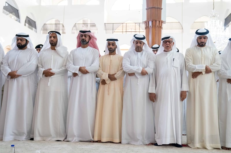 Sheikh Ammar bin Humaid, Crown Prince of Ajman, and Sheikh Mohammed bin Hamad, Crown Prince of Fujairah, perform funeral prayers on the body of Sheikh Khalid. Wam