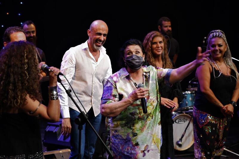 Lebanese artists greet the audience and sing during the reopening of the 'City Theatre' in Al Deena Theatre, Beirut, after being closed down beause of the coronavirus pandemic. EPA