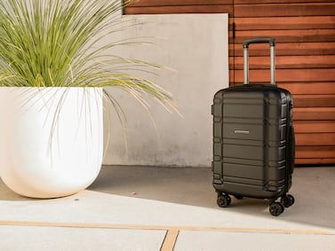 Cabin bags with wheels are easier to cart around but typically weigh more than backpacks, so make your choice carefully. Photo: American Green Travel / Unsplash