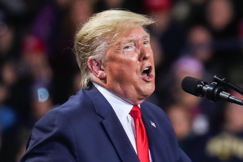 US President Donald Trump speaks to supporters during a campaign rally in Battle Creek, Michigan, US, December 18, 2019. Reuters