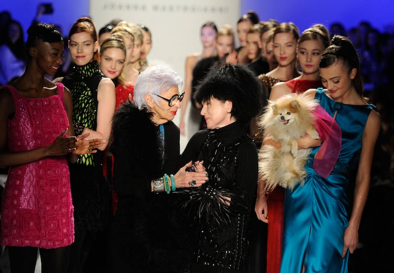 Iris Apfel, left, joins designer Joanna Mastroianni for her autumn/winter fashion show in February 2012. AFP