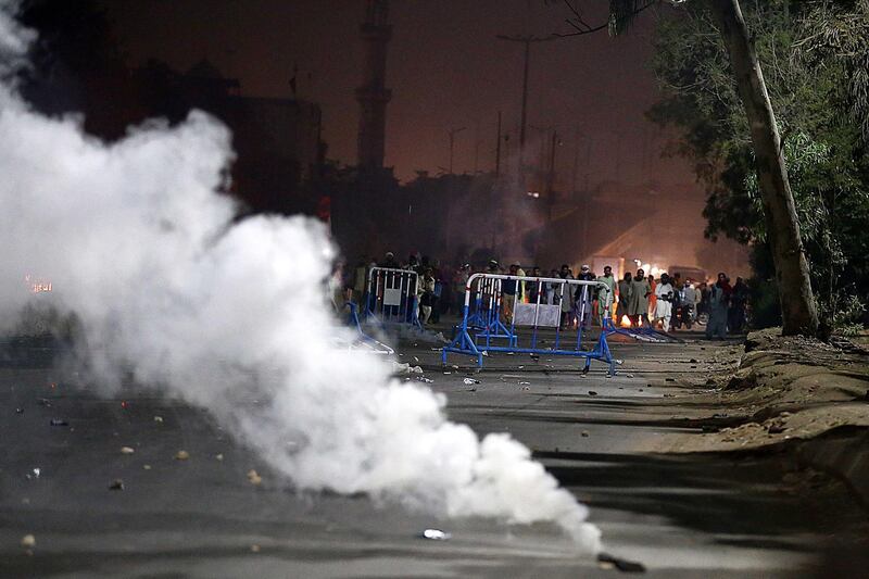 Police fire tear-gas canisters to disperse supporters of Islamic political party Tehrik Labaik Ya RasoolAllah (TLP) during a protest over the Khadim Hussain Rizvi arrest in Karachi. Tehreek-e-Labbaik Pakistan (TLP) chief Khadim Hussain Rizvi has been taken into protective custody by the police.  EPA