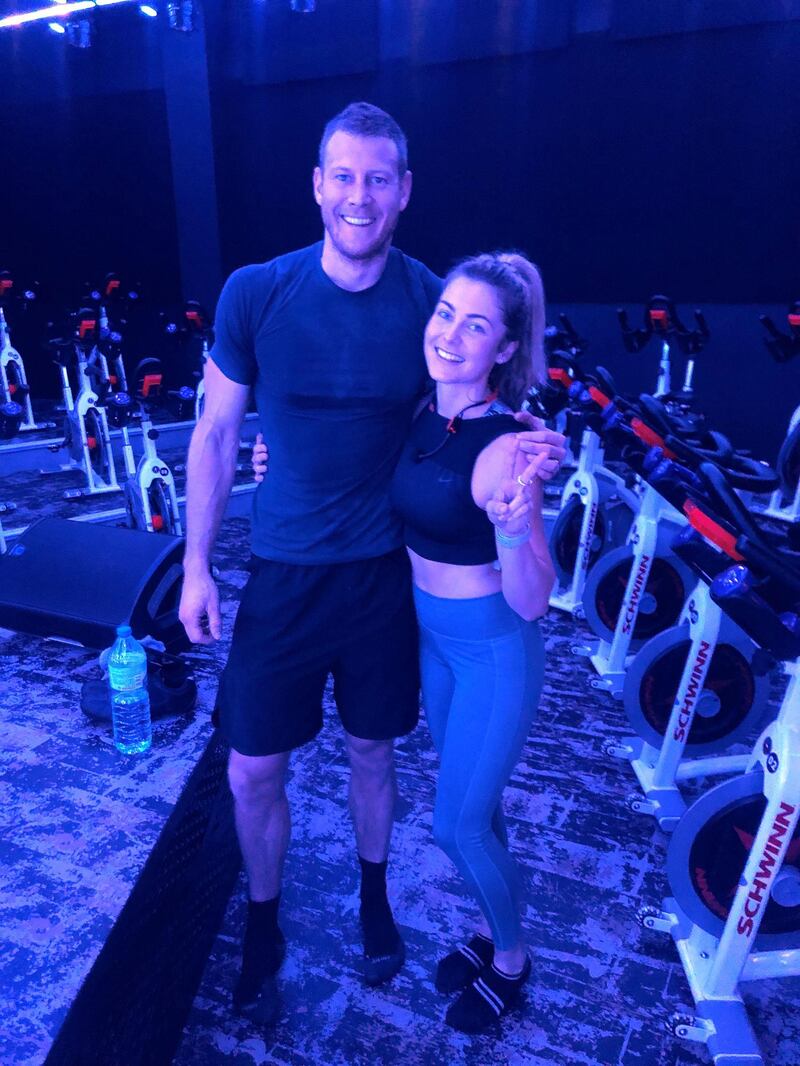 'Game of Thrones' and 'The Umbrella Academy' star Tom Hopper was seen working out at spin studio, Crank, on February 28. Photographed here with instructor, Holly Drake. Courtesy Crank 