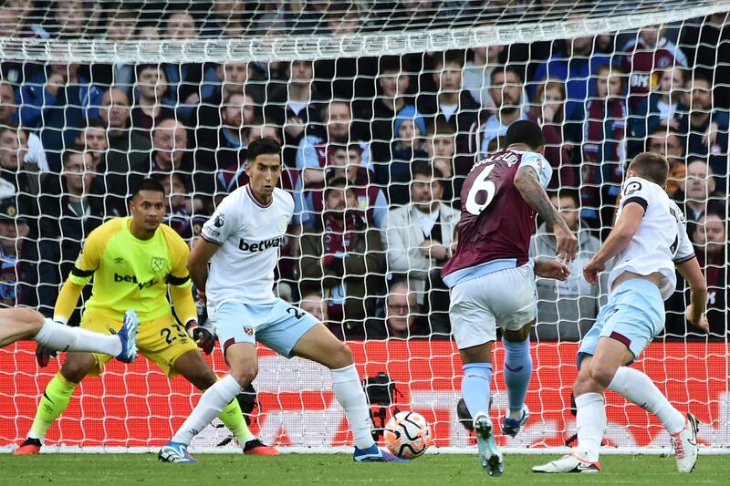 Aston Villa's Douglas Luiz, second from right, scores his side's opening goal. AP 