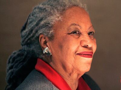 FILE - In this Nov. 8, 2006 photo, American Nobel laureate and "Beloved" author Toni Morrison smiles during a press conference at the Louvre Museum in Paris. Morrison and "Queen of Soul" Aretha Franklin will be inducted into the National Women's Hall of Fame Thursday, Dec. 10, 2020 as part of a posthumous class of Black honorees that also includes Henrietta Lacks, whose cells were widely used in biomedical research; Barbara Hillary, the first Black woman to travel to both the North and South Pole, and civil rights activists Barbara Rose Johns Powell and Mary Church Terrell. (AP Photo/Michel Euler, File)