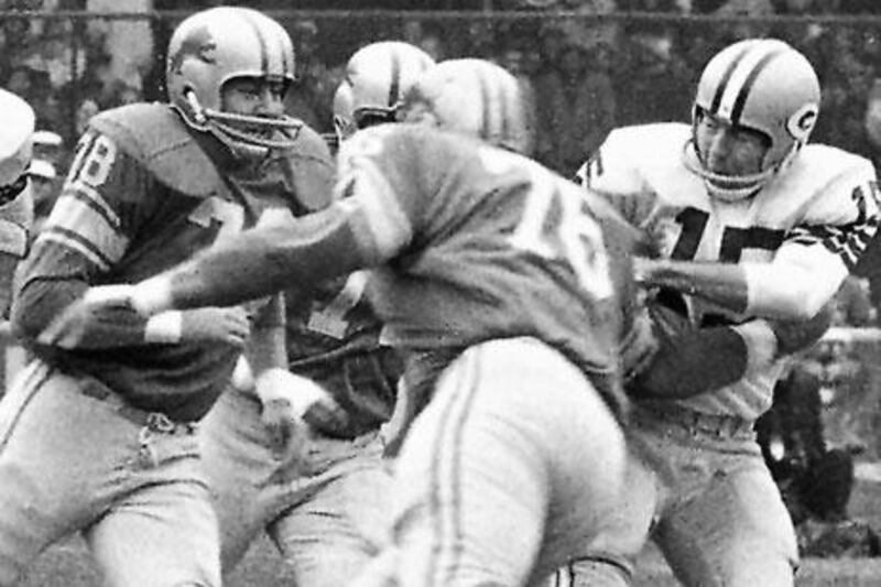 Back in 1962,  Darris McCord (78), Roger Brown (76) and the rest of the Lions' defence made things rough for Bart Starr, right, and the Green Bay Packers on Thanksgiving Day. The present-day Lions hope history repeats itself.