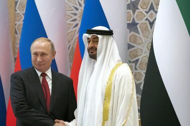 ABU DHABI, UNITED ARAB EMIRATES - October 15, 2019: HH Sheikh Mohamed bin Zayed Al Nahyan, Crown Prince of Abu Dhabi and Deputy Supreme Commander of the UAE Armed Forces (R) and HE Vladimir Putin Vladimirovich, President of Russia (L), stand for a photograph during a state visit reception at Qasr Al Watan.  ( Rashed Al Mansoori / Ministry of Presidential Affairs ) ---