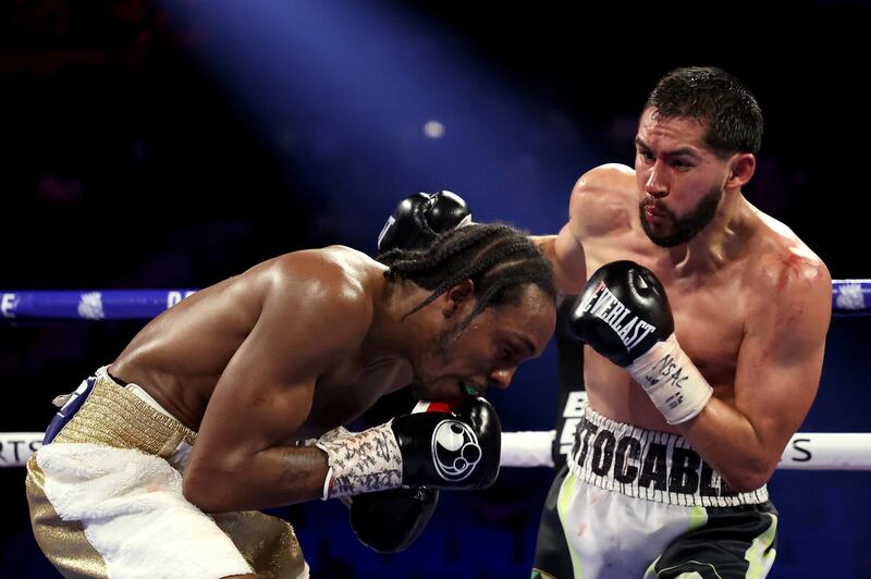 Javier Molina (R) punches Amir Imam during their super lightweight bout  at MGM Grand Garden Arena in Las Vegas.  AFP