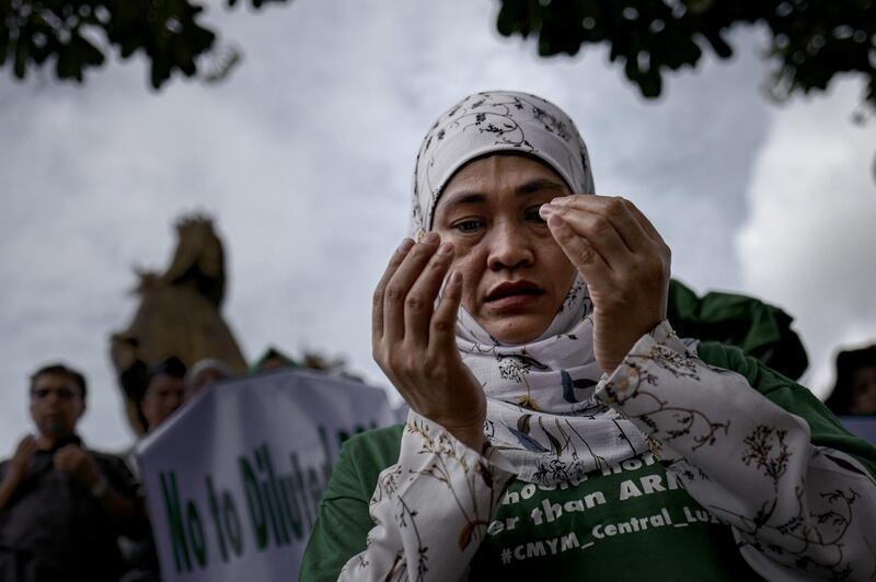 MANILA, PHILIPPINES - JULY 11: Muslim and Christian activists hold a picket during the bicameral talks between Philippine senate and congress that would determine the fate the Muslim community's long time bid for self-governance and self-determination, on July 11, 2018 in Manila, Philippines. The Musilm separatist group, Moro Islamic Liberation Front and the government in the latest peace accord last 2014, had agreed on a comprehensive agreement that would ultimately be drafted and signed into law that gives the MILF and its Muslim constiruents an extended autonomy compared to the existing autonomous governance first setup by the government and preceding rebel group, the MNLF. Moro Islamic Liberation Front chief negotiator Mohagher Iqbal said that this agreement is the only political solution the Moro problem that has resulted to nearly half a century of conflict in the southern Philippines.  (Photo by Jes Aznar/Getty Images)