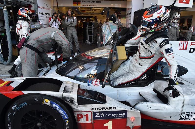 England’s driver NickTandy takes a relay of his Porsche 919 Hybrid. AFP