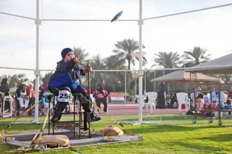 Ahad Alresheedi of Kuwait takes part in the women's discus throw event on the first day's schedule yesterday. Lee Hoagland /The National