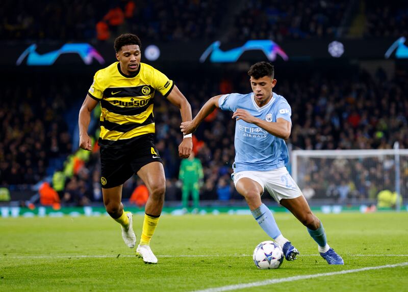 Manchester City midfielder Matheus Nunes on the ball against Young Boys' Aurele Amenda. PA