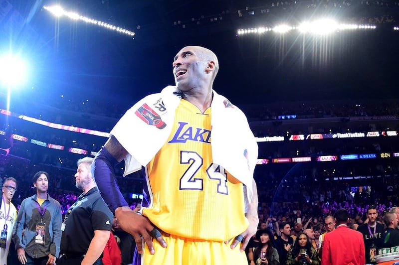 Kobe Bryant celebrates after scoring 60 points in his last NBA game at the Staples Centre in Los Angeles on April 13, 2016. AFP