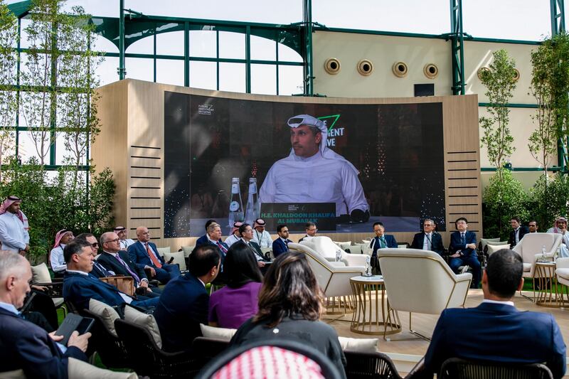 A screen broadcasts Khaldoon Al Mubarak, chief executive officer of Mubadala Investment Company, addressing the Future Investment Initiative in Riyadh. Bloomberg