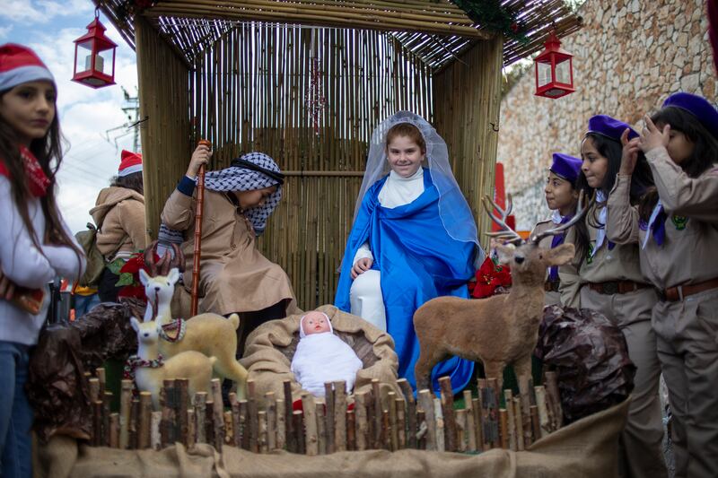 Israeli Arab Christians wear traditional custom celebrate the annual Christmas parade in Nazareth, Israel. AP