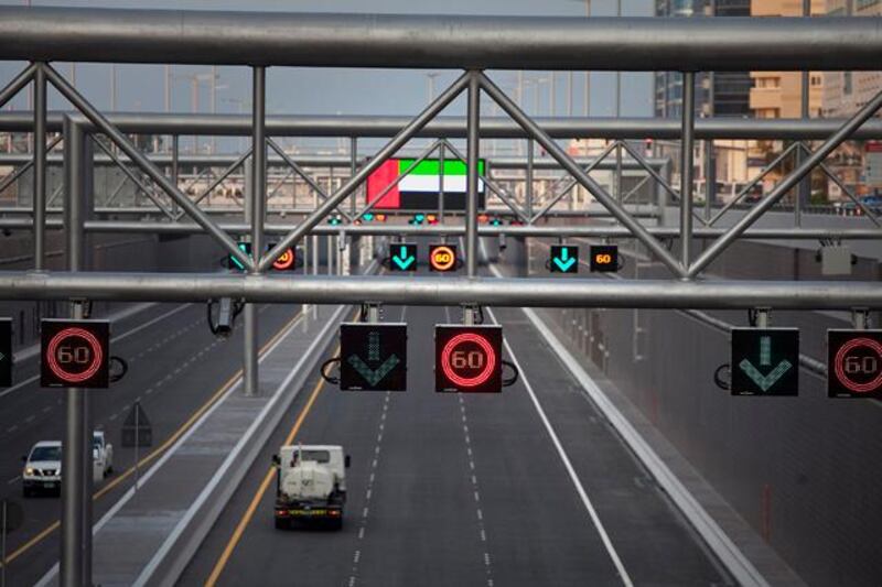 Abu Dhabi, United Arab Emirates, December 04, 2012:  
Traffic downtown Abu Dhabi still bypasses the new Salam Tunnel on Tuesday evening, Dec. 4, 2012, as the cars trail above ground around it. Traffic at the tunnel is set to open at 6am the following day.   Silvia Razgova / The National


