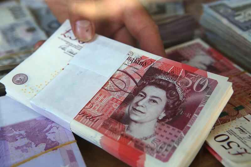 The UK pound slumped to a 20-month low in December. AFP