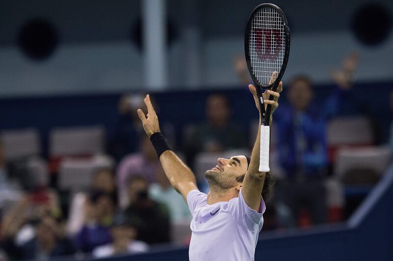 Roger Federer of Switzerland gestures after beating Rafael Nadal of Spain in their men's singles final match at the Shanghai Masters tennis tournament in Shanghai on October 15, 2017. / AFP PHOTO / Nicolas ASFOURI