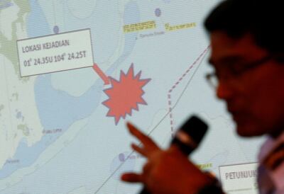 Malaysia Maritime Enforcement Agency officer talks about the area of the search and rescue operations for missing personnel of USS John McCain in Putrajaya, Malaysia. Reuters