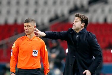 PSG's head coach Mauricio Pochettino gestures from the touchline during the French League One soccer match between Paris Saint-Germain and Brest at the Parc des Princes in Paris, Saturday, Jan. 9, 2021. (AP Photo/Francois Mori)