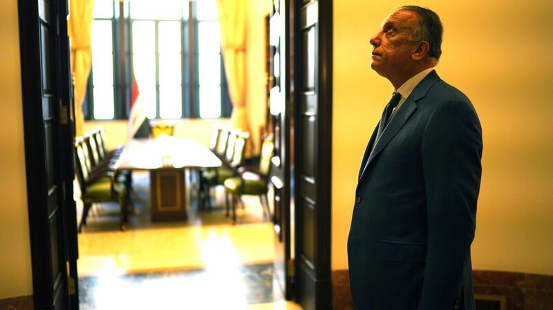 Iraqi Prime Minister Mustafa al-Kadhimi waits for delegations at the prime minister's office in Baghdad, Iraq May 14, 2020. Picture taken May 14, 2020.  Iraqi Prime Minister Media Office/Handout via REUTERS ATTENTION EDITORS - THIS IMAGE WAS PROVIDED BY A THIRD PARTY.