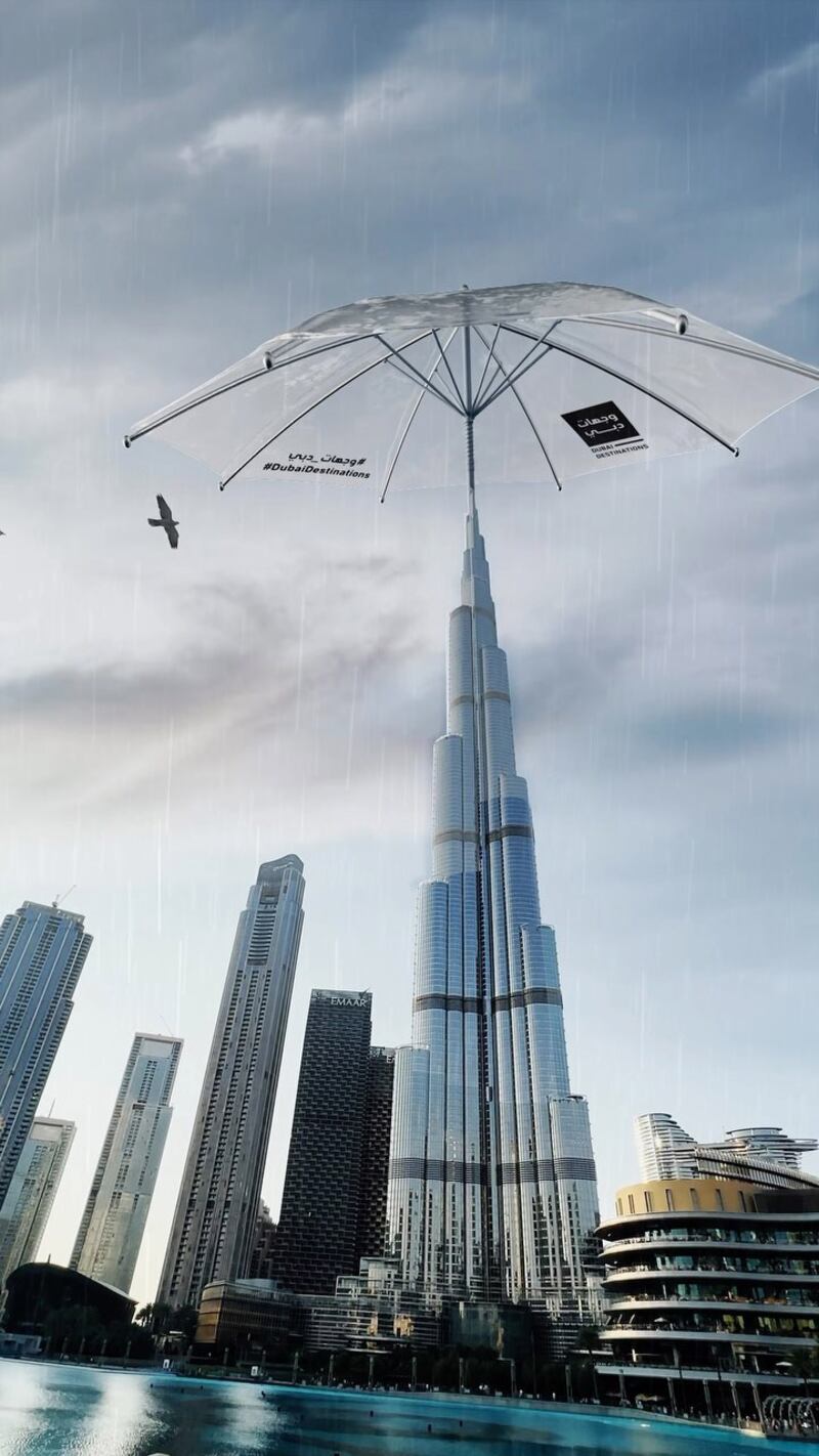 A video shared by Sheikh Hamdan shows Burj Khalifa sheltering itself with an umbrella. Photo: Sheikh Hamdan / Instagram